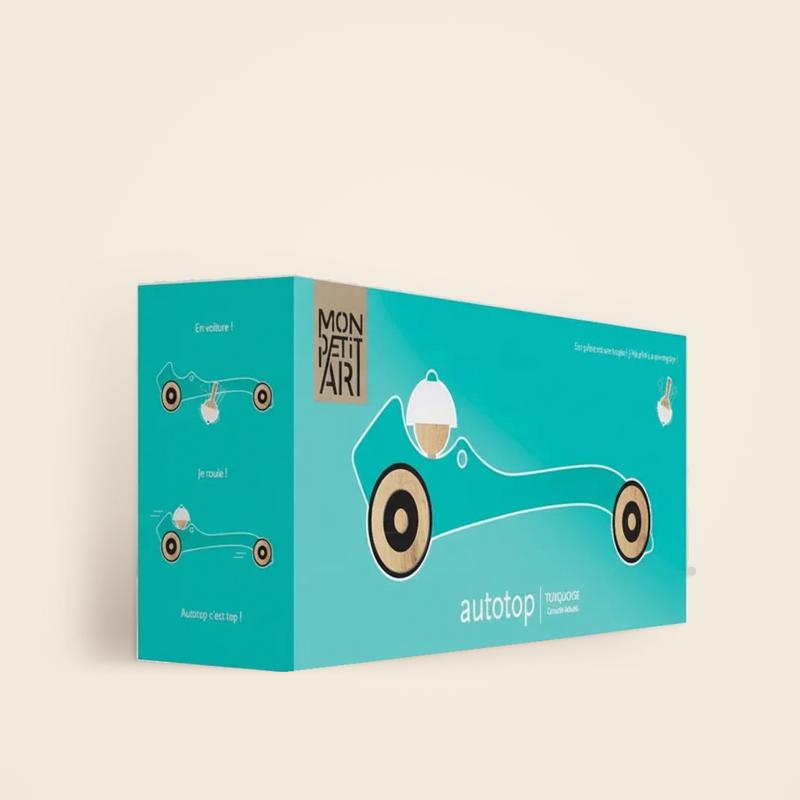Autotop Turquoise, voiture toupie en bois par Gonzalo Arbutti
